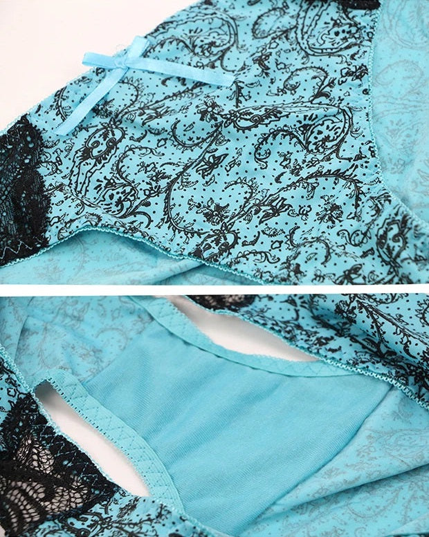 Gros plan sur la dentelle noire et le nœud turquoise d’un soutien-gorge COUPRA Intimates.